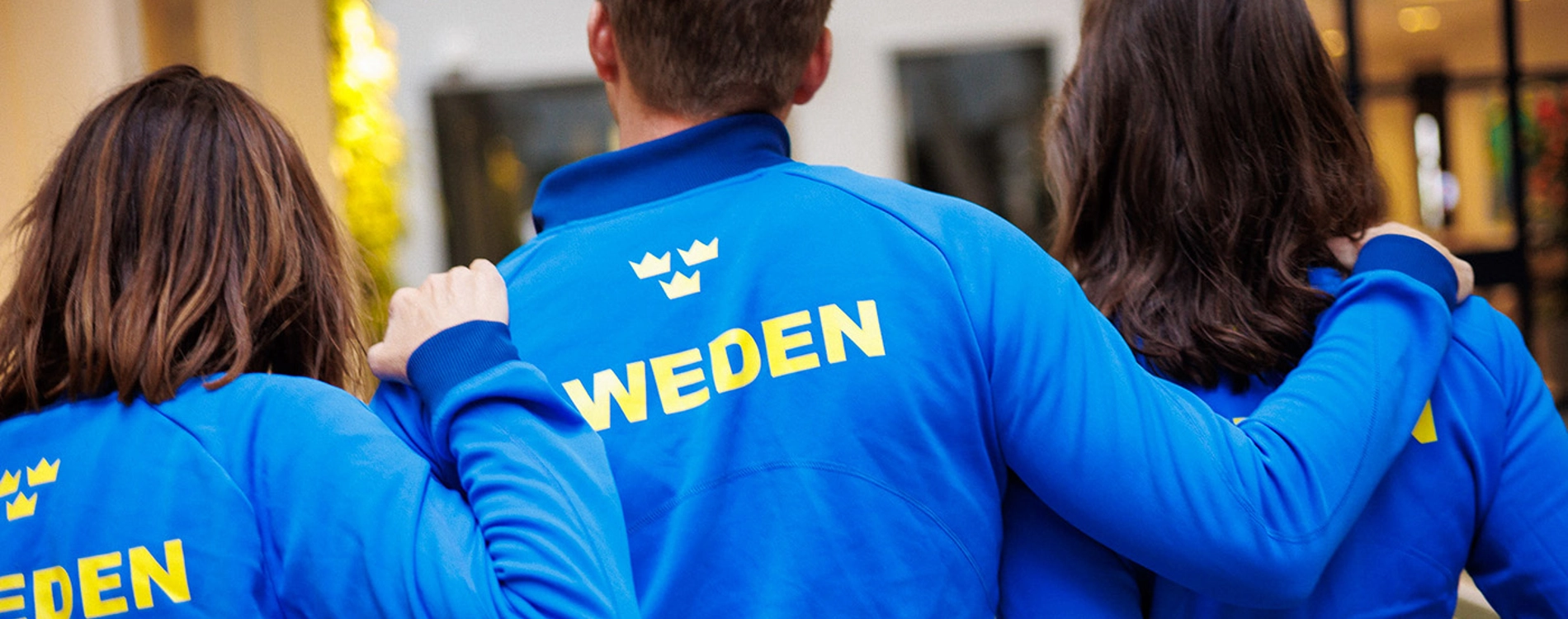 3 medarbetare bakifrån