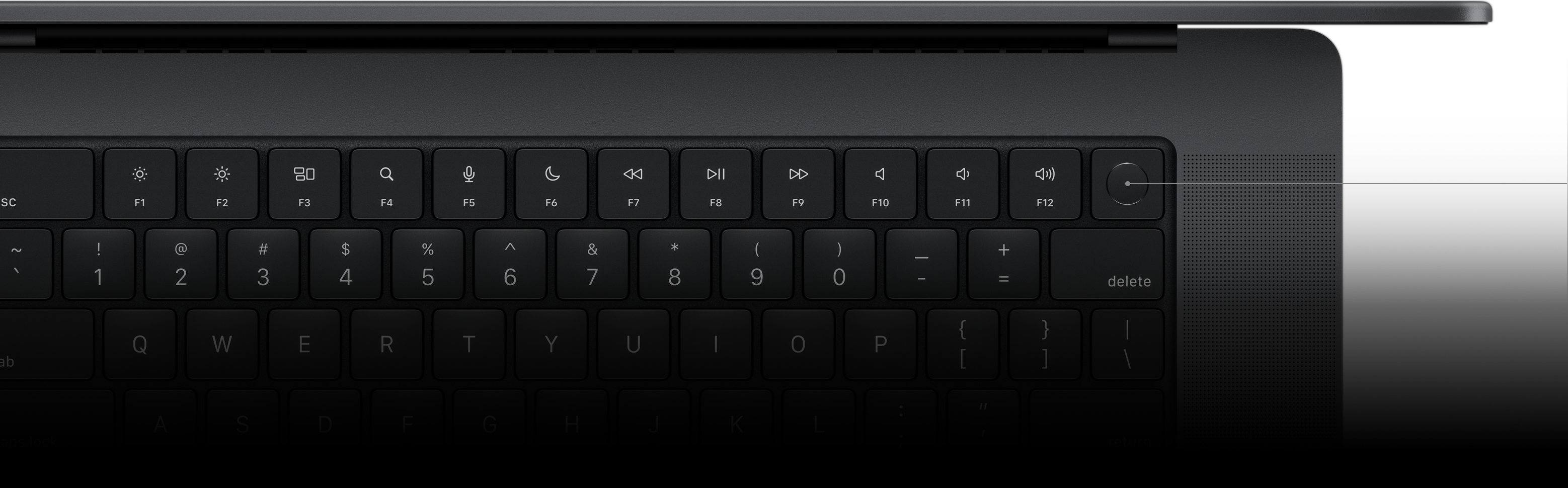 Pil som pekar ut Touch ID-tangenten på Magic Keyboard.